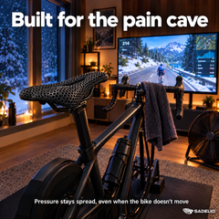 Sadelio 3D saddle on a bike mounted on a smart trainer in a home pain cave